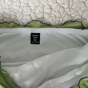 Green strapless ruffle dress